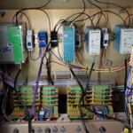 SimStacks installed behind a P6 panel with Power Supplies and distribution blocks.