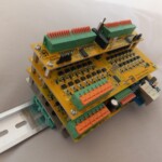 A SimStack with DIN Rail mounting brackets installed.